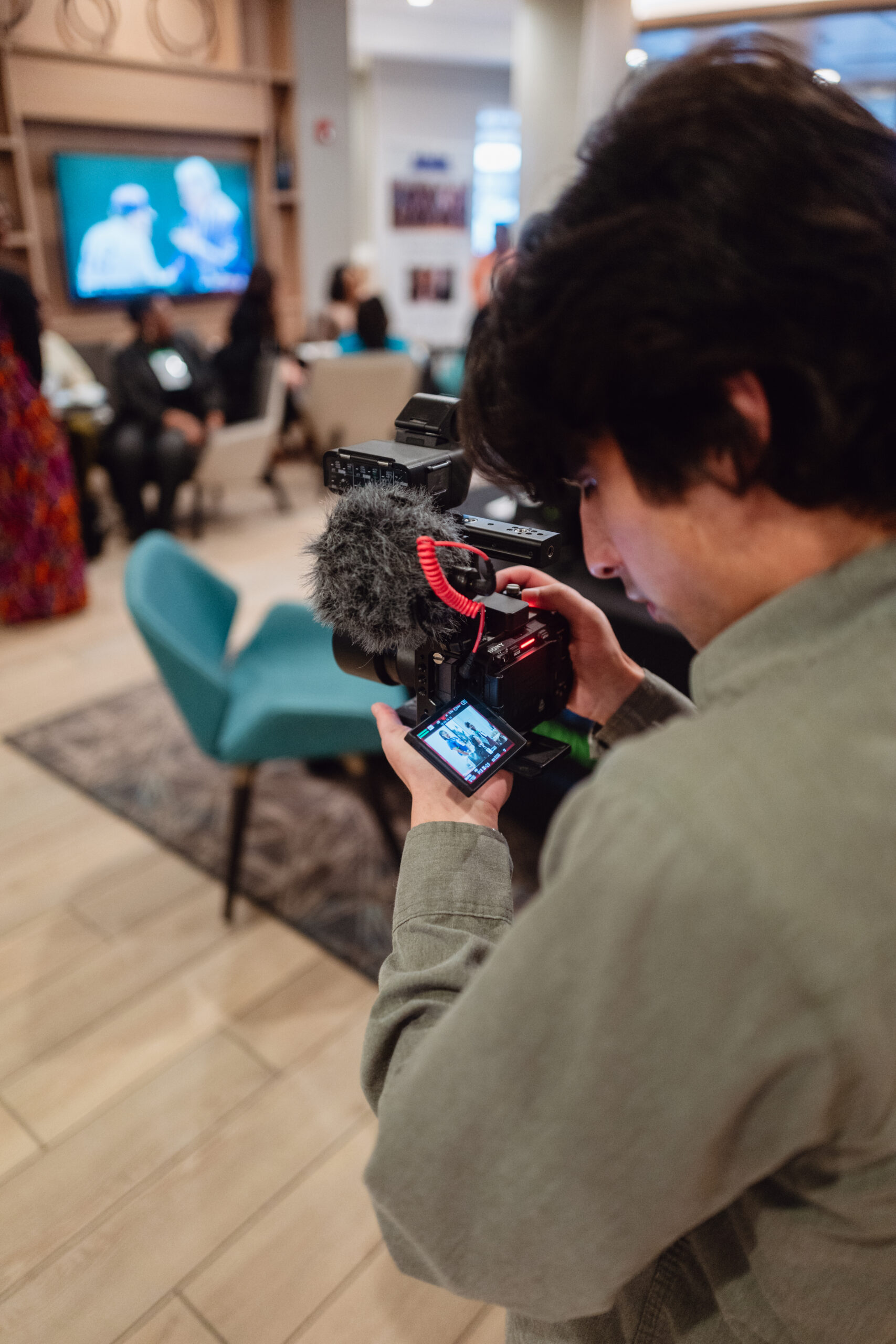 Closeup of cameraman recording